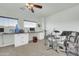Well-lit office with countertop desk, suitable for hobbies or home business at 44314 W Mescal St, Maricopa, AZ 85138