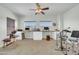 Bright office space with a long countertop desk, perfect for working from home at 44314 W Mescal St, Maricopa, AZ 85138