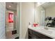 Bathroom featuring modern vanity with white countertop, framed mirror and sleek faucet at 5012 S Girard St, Gilbert, AZ 85298