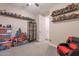 bedroom featuring toy display shelves and adjacent closet for storage at 5012 S Girard St, Gilbert, AZ 85298