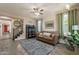 Inviting living room showcases hardwood style floors and staircase leading to the second floor at 5012 S Girard St, Gilbert, AZ 85298