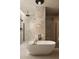 Modern bathroom featuring a soaking tub, walk-in shower, and stylish neutral tile work at 5101 N Casa Blanca Dr # 223, Paradise Valley, AZ 85253