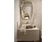 Modern bathroom with a unique stone sink and decorative mirror at 5101 N Casa Blanca Dr # 223, Paradise Valley, AZ 85253