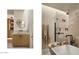 Well-appointed bathroom with modern fixtures, soaking tub, glass shower, and sleek vanity at 5101 N Casa Blanca Dr # 223, Paradise Valley, AZ 85253
