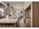 Well-lit kitchen featuring a spacious island, modern appliances, and stylish fixtures at 5101 N Casa Blanca Dr # 223, Paradise Valley, AZ 85253