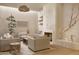 Inviting living room with neutral tones, comfortable seating, and a unique fireplace design at 5101 N Casa Blanca Dr # 223, Paradise Valley, AZ 85253