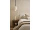 Serene bedroom featuring a plush bed, neutral tones, stylish lighting, and modern décor at 5101 N Casa Blanca Dr # 223, Paradise Valley, AZ 85253