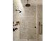 Spa-like shower featuring modern fixtures, neutral tiling, and glass surround at 5101 N Casa Blanca Dr # 223, Paradise Valley, AZ 85253