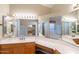 Large vanity with dual sinks and bright lighting in spacious bathroom at 5185 W Del Rio St, Chandler, AZ 85226