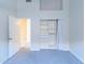 Bedroom with carpeted floors, open closet and neutral walls at 5185 W Del Rio St, Chandler, AZ 85226
