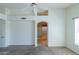 Spacious bedroom with vaulted ceiling, an archway to the bathroom, and a dual window at 5185 W Del Rio St, Chandler, AZ 85226