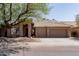 Charming single-story home with a three-car garage and a well-maintained front yard at 5185 W Del Rio St, Chandler, AZ 85226