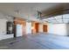 Spacious two car garage with storage cabinets and shelving at 5185 W Del Rio St, Chandler, AZ 85226