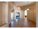 Open-concept living area with arched doorways and tile flooring at 5185 W Del Rio St, Chandler, AZ 85226