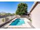 Backyard swimming pool with privacy fence and desert landscaping at 5185 W Del Rio St, Chandler, AZ 85226