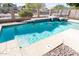 Backyard swimming pool with tile waterfall feature at 5185 W Del Rio St, Chandler, AZ 85226