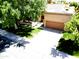 Charming home with a two-car garage, well-maintained lawn, and mature trees providing ample shade at 563 N Spanish Springs Dr, Chandler, AZ 85226