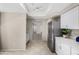 Clean kitchen with stainless steel appliances and view into the hallway at 563 N Spanish Springs Dr, Chandler, AZ 85226