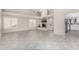 Spacious living room featuring tile floors, fireplace, and sliding glass door at 563 N Spanish Springs Dr, Chandler, AZ 85226