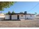 Home with a covered patio, gravel landscaping, and a classic exterior paint scheme at 6130 N 27Th Ave, Phoenix, AZ 85017