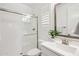 Bathroom featuring a glass-enclosed shower, toilet, shutters, and vanity with a decorative plant at 634 E Deer Creek Rd, Phoenix, AZ 85048