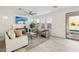 Bright living room featuring stylish decor, comfortable seating, and ample natural light from large windows at 634 E Deer Creek Rd, Phoenix, AZ 85048
