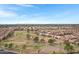 Expansive aerial view of neighborhood, highlighting the neatly laid out streets, golf course and desert landscaping at 6341 S Cypress Point Dr, Chandler, AZ 85249