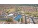 Gorgeous aerial view of a Primary-planned community with lush landscaping, golf course, and community pool at 6341 S Cypress Point Dr, Chandler, AZ 85249