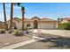 Charming single-story home featuring a tile roof, desert landscaping, and an attached two-car garage at 6341 S Cypress Point Dr, Chandler, AZ 85249