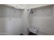 Walk-in closet with ample storage space, shelving, and a convenient laundry basket at 650 N Hawes Rd # 3123, Mesa, AZ 85207
