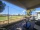 Relaxing covered patio featuring beautiful views of the golf course at 650 N Hawes Rd # 3123, Mesa, AZ 85207