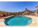 Sparkling private pool is surrounded by landscaped gardens, perfect for relaxation and outdoor enjoyment at 7103 E Medina Ave, Mesa, AZ 85209