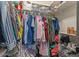 Walk-in closet with ample hanging space, shelving, and organized storage solutions at 7129 E Broadway Rd # 72, Mesa, AZ 85208
