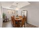 Bright dining room with stylish chandelier and large decorative mirror at 7129 E Broadway Rd # 72, Mesa, AZ 85208