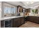 Bright kitchen featuring modern appliances, quartz countertops and under cabinet wine cooler at 7129 E Broadway Rd # 72, Mesa, AZ 85208