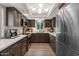 Updated kitchen featuring quartz countertops, stainless appliances, and modern lighting at 7129 E Broadway Rd # 72, Mesa, AZ 85208