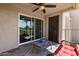 Inviting patio with sliding glass door, comfortable seating, and picturesque golf course scenery at 7129 E Broadway Rd # 72, Mesa, AZ 85208
