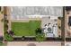 Aerial view of a home with a well-maintained lawn and outdoor seating area including a fire pit at 7149 E Plata Ave, Mesa, AZ 85212