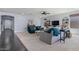 Inviting living room features plush seating, a ceiling fan, and neutral decor at 7149 E Plata Ave, Mesa, AZ 85212