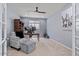 This home office space features neutral walls and includes a ceiling fan at 7149 E Plata Ave, Mesa, AZ 85212