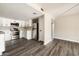 Open floor plan of kitchen to living area, with stainless steel refrigerator at 7920 E Camelback Rd # 110, Scottsdale, AZ 85251