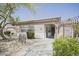 Charming exterior with desert landscaping, a covered walkway, and a bike rack creates an inviting community amenity at 7978 W Zoe Ella Way, Peoria, AZ 85382