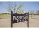 Paseo Verde Park sign welcomes residents to enjoy the community's green spaces and recreational amenities at 7978 W Zoe Ella Way, Peoria, AZ 85382