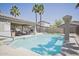 This refreshing community pool offers residents a relaxing oasis with ample seating and a covered area for shade at 7978 W Zoe Ella Way, Peoria, AZ 85382