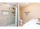 Updated bathroom features a frameless glass shower, double sink vanity and new fixtures at 8616 E Diamond St, Scottsdale, AZ 85257