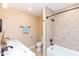 Elegant bathroom with dual sinks, vanity and shower and tub combination with marble surround at 8616 E Diamond St, Scottsdale, AZ 85257