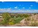 Scenic golf course view overlooking the city, with mountain backdrop and pristine green fairway at 9012 S 47Th Pl, Phoenix, AZ 85044