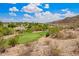 Expansive view of the golf course and desert landscape, showcasing the natural beauty of the area at 9012 S 47Th Pl, Phoenix, AZ 85044