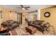 Inviting living room with barn door and leather seating, great for relaxation at 9012 S 47Th Pl, Phoenix, AZ 85044