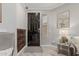 Bright entryway with a decorative mirror, stylish lighting, and a wood accent wall at 9463 W Ross Ave, Peoria, AZ 85382